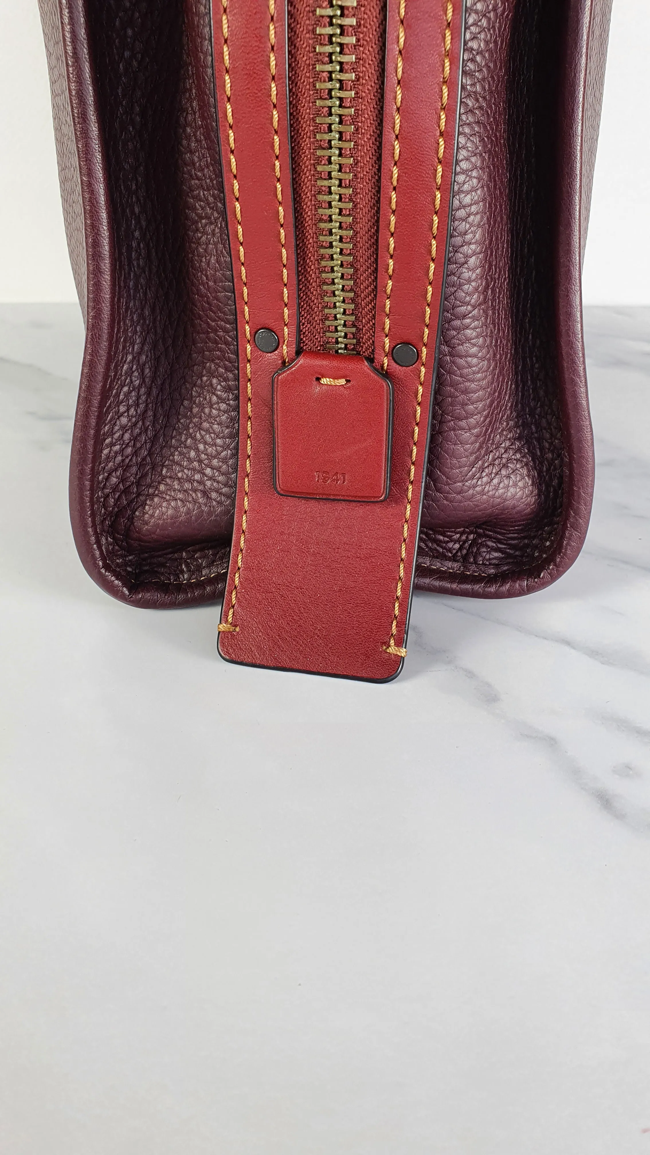 Coach 1941 Rogue 31 in Oxblood Pebble Leather with Red Suede Lining Satchel Handbag - Coach 38124