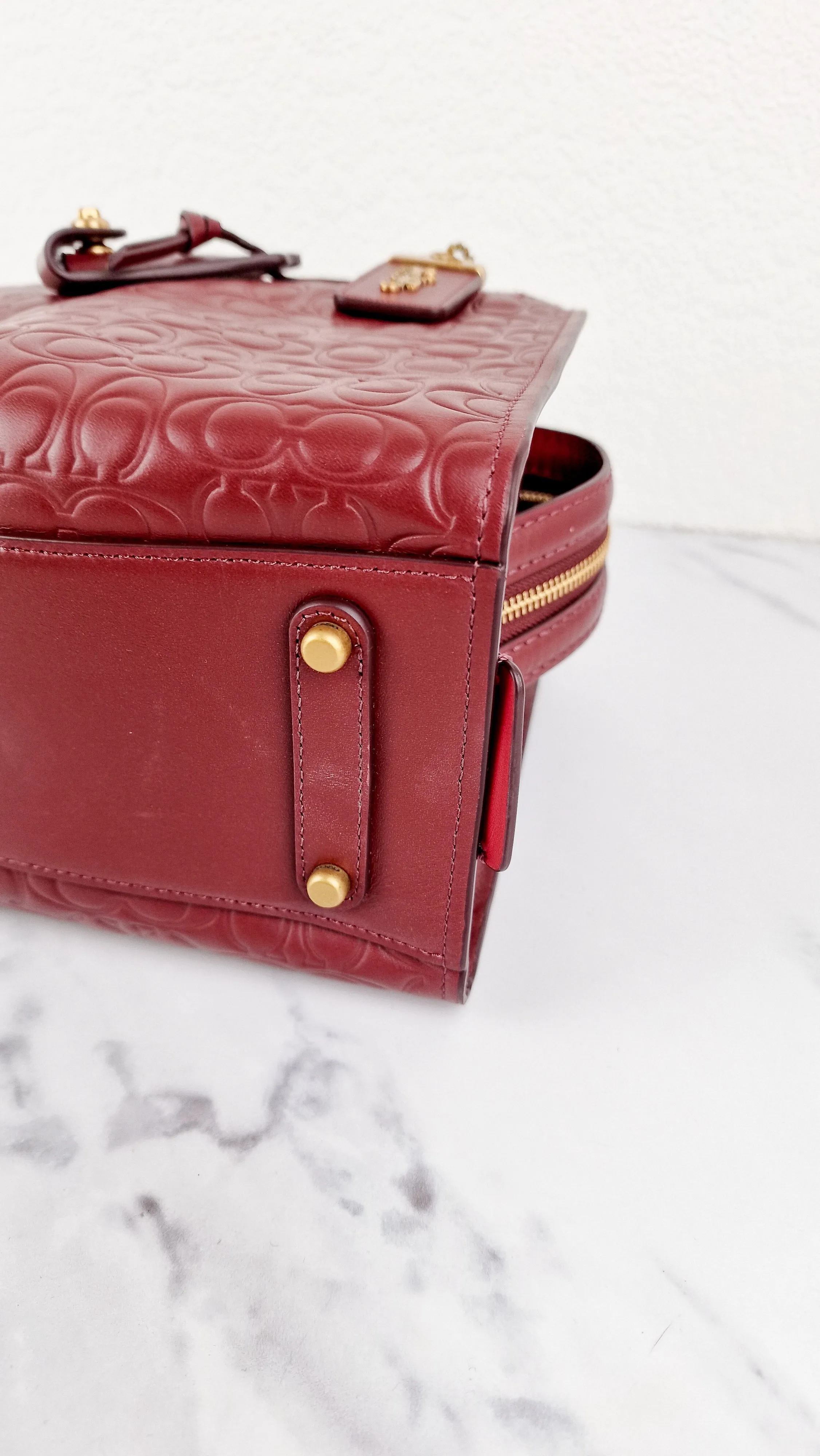 Coach Rogue 25 in Burgundy Signature Embossed Leather Floral Bow Lining - Coach 26839